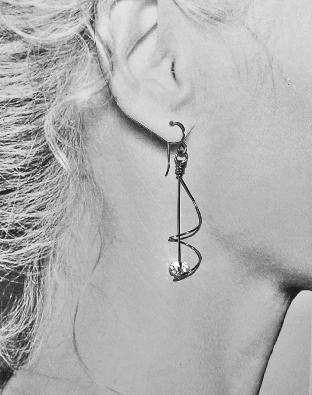 Titanium and Crystal Spiral Earrings.jpg